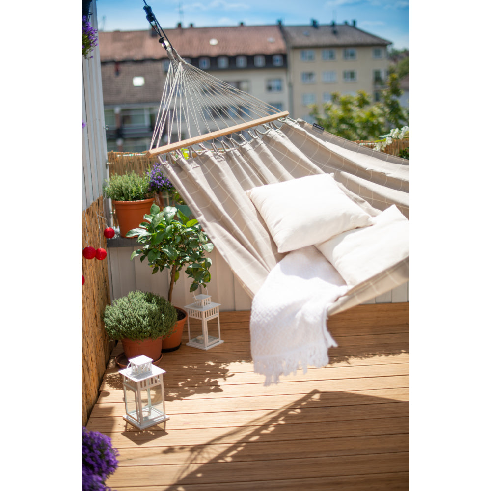 Outdoor material hammock hung on deck
