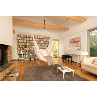 Indoor white hammock chair in living room