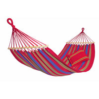 Colorful striped hammock with a pillow on a white background