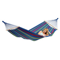 Colorful striped hammock with a person on a white background