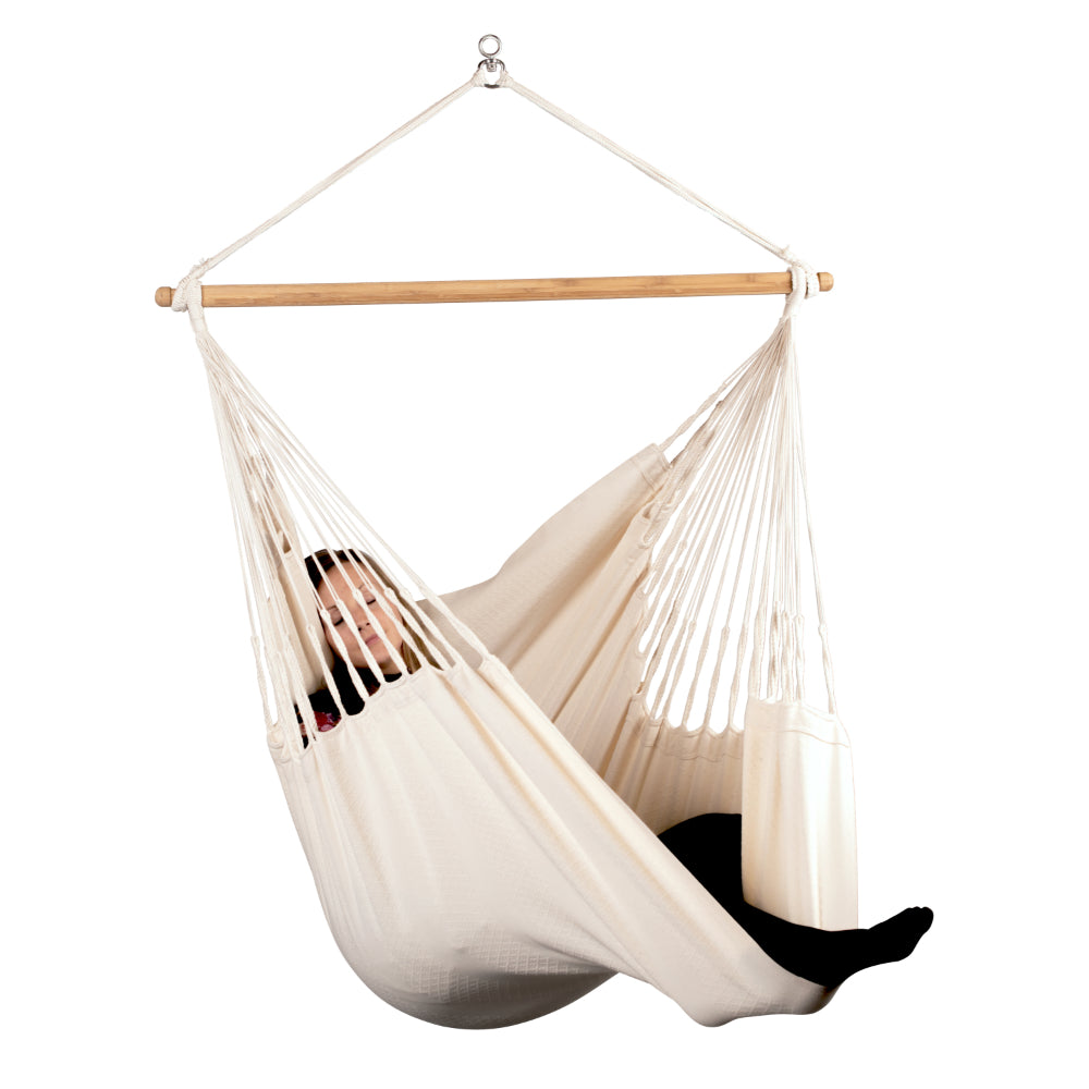 Woman asleep in hammock swing chair