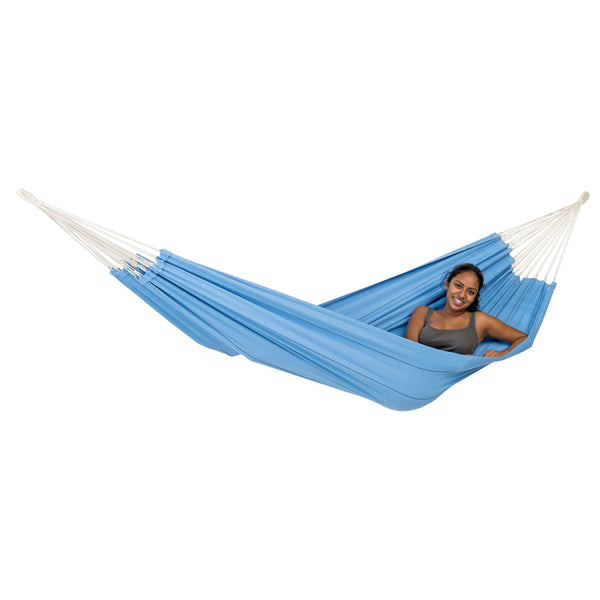 Blue hammock with white ropes on a white background