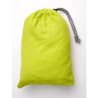 Green drawstring bag on a white background
