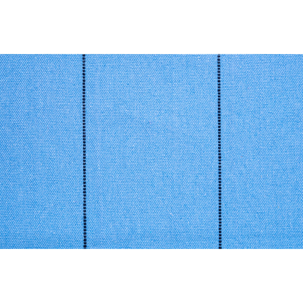 Close-up of blue fabric with a subtle pattern on a white background