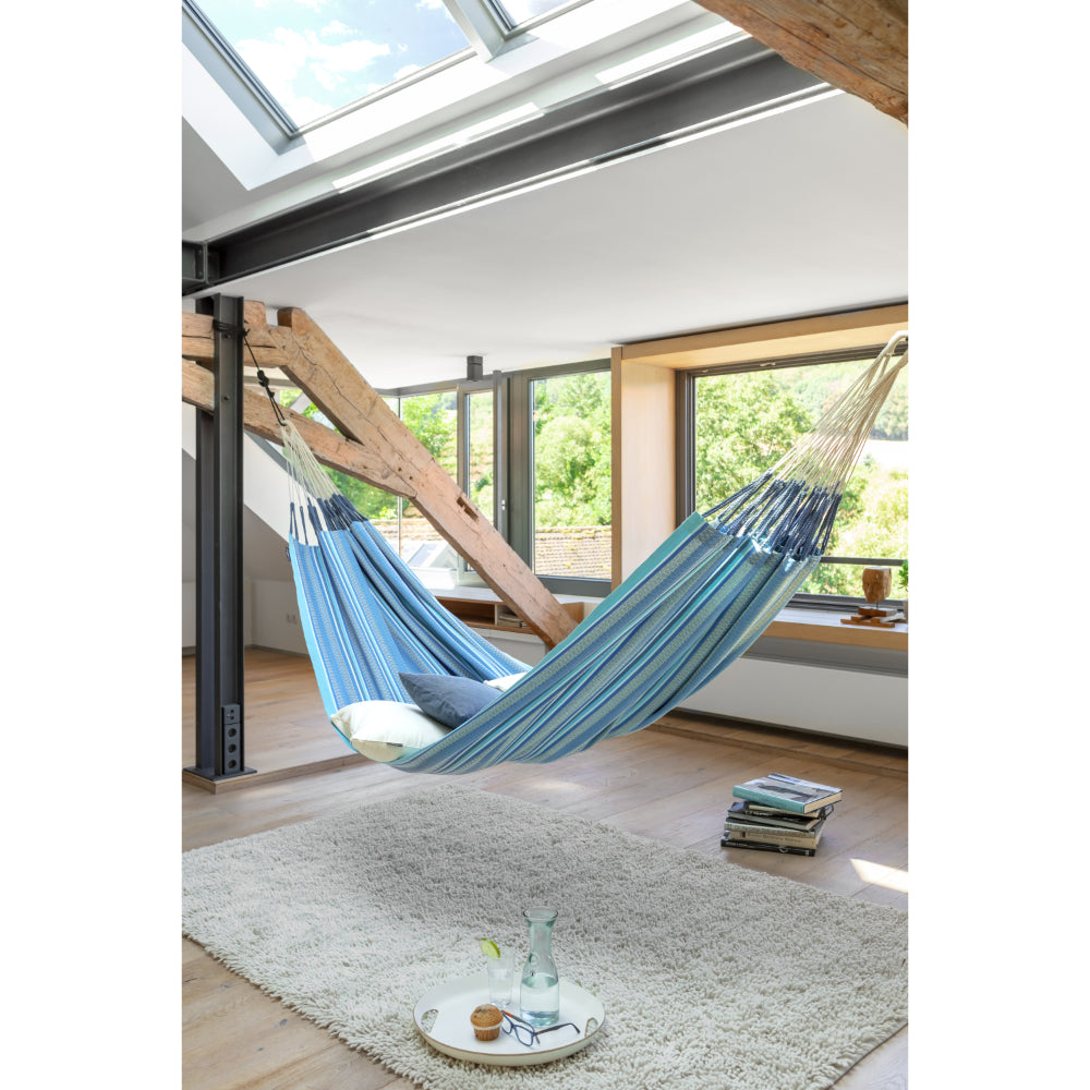 Azure - blue and white indoor hammock suspended by internal metal beams