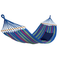 Colorful striped hammock with a pillow on a white background