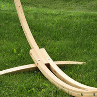 Close up of Vivere pine wooden hammock stand on grass