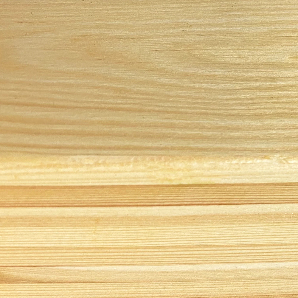 Close-up of a wooden stand surface with a natural grain pattern