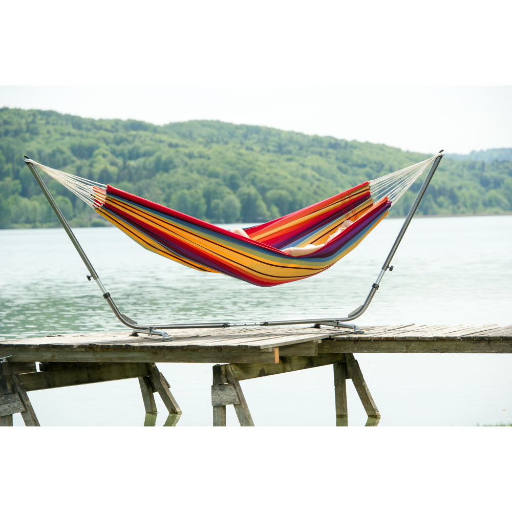 Hammock on metal frame by water