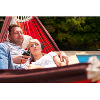 Couple napping in hammock