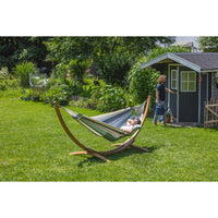 Hammock on stand on lawn in garden